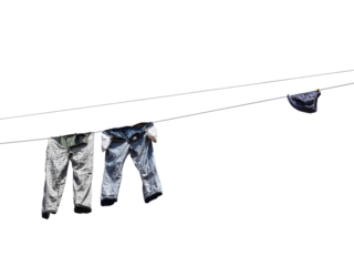 Clothesline above a street in Tuscany.