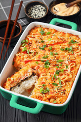 sushi bake with salmon, rice, seaweed, crab meat