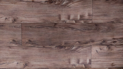 brown wood floor texture with abstract scratch shapes
