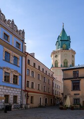 Naklejka premium Architecture of Lublin Old Town, Lesser Poland. View of traditional colored tenements houses on central streets of Polish city of Lublin in sunny spring day