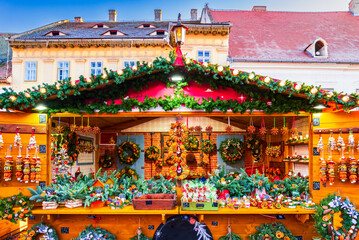 Sibiu, Romania. Christmas Market in Large Square, medieval downtown of Transylvania, famous European Xmas Fair.