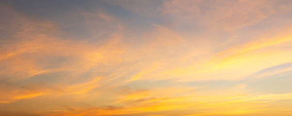 Sunset Sky on Twilight in the winter Evening with Orange Gold Sunset Cloud Nature Colorful Sky...