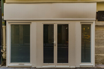 beige french boutique facade , parisian storefront template , vintage shop entrance door