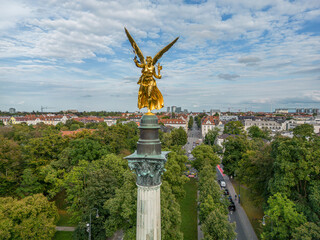 Fototapeta premium aerial golden peace angel Friedensengel in Muenchen City Statue Munich fountain