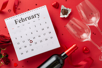 Valentine's Day countdown:top view February calendar, chocolates, wine, glasses, roses, silk...