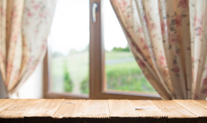 Empty beautiful wood table top counter and blur bokeh modern kitchen interior background in clean and bright,Banner, Ready for product montage. High quality photo