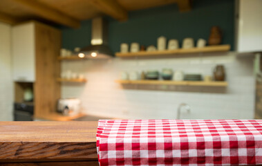 Cloth napkin on wood table with glass window background.for disign product display. High quality photo