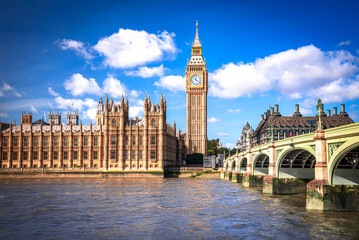 Fototapeta na wymiar London, United Kingdom. Westminster Bridge, Big Ben and House of Commons building in background, travel english landmark on sunny day.