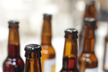 Bottles of brown glass, stock photo. Set of Empty Bottles. Drinks. glass bottles in the basket