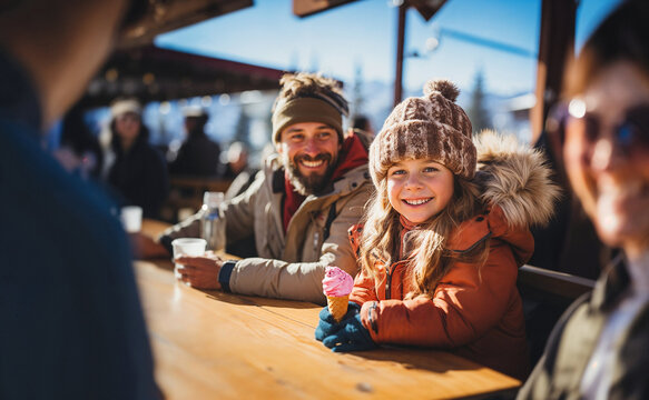 Family on vacation in the mountains, sharing a momment with friends in a good mood, on a terrace. The little girl enjoy an ice-cream. Generative ai