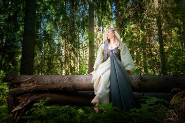 Beautiful seductive dryad. Pagan spirit of the forest. Portrait of beautiful dryad. Fairy who loves...
