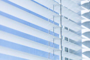 detail of venetian blinds, solar shades, window shutters, window blinds and shades