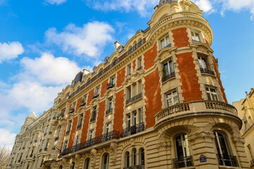 real estate , haussmannian architecture in Paris , red bricks facade