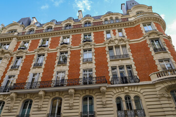 real estate , haussmannian architecture in Paris , red bricks facade