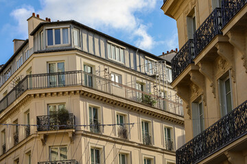 typical parisians building facade , haussmannian style , 2nd arrondissement