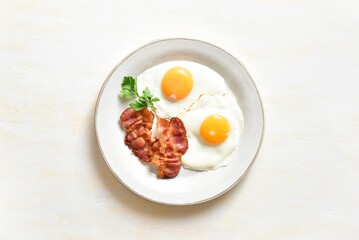 Fried eggs with bacon