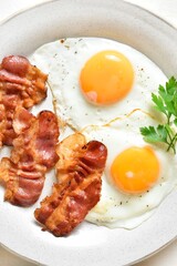 Fried eggs with bacon