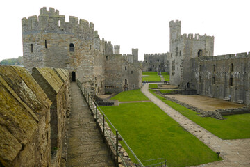 Historic Caernarfon Castle, medieval fortress, popular tourist landmark, Wales, United Kingdom