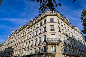 typical parisians building facade , haussmannian style  3rd arrondissement