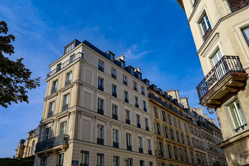 typical parisians building facade , haussmannian style  3rd arrondissement