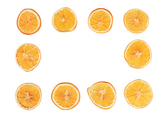 sliced dried oranges on a white isolated background close up