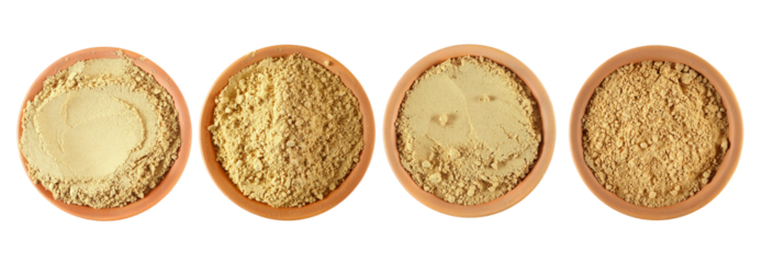 Set ginger powder, ground in clay pot isolated on white, top view