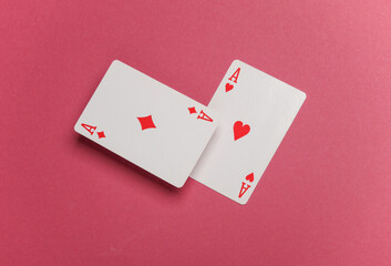 Diamond and ace of hearts on pink background