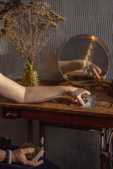 a woman makes a layout on tarot cards, tells fortunes, plays solitaire, predicts the future