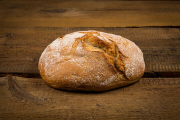 white bread over wooden background