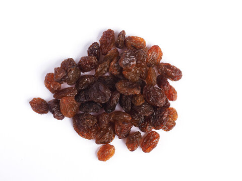 Tasty organic raisins, close up, texture image using as background or header,