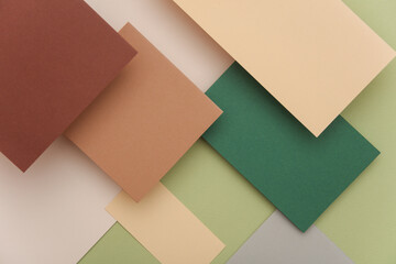Group of floating colored blank cards sheet with shadow on beige green background. Minimalism...