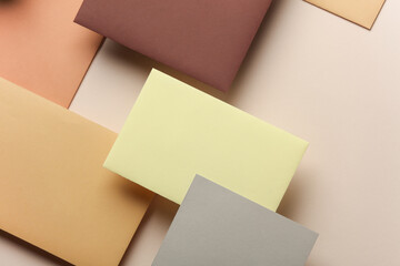 Group of colored blank cards sheet with shadow on beige background. Minimalism business brand...