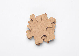 Wooden pieces jigsaw puzzle on white background