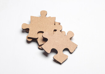 Wooden pieces jigsaw puzzle on white background