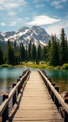 Fototapeta premium Wooden Bridge Over Water with Mountainous Backdrop