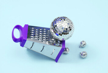 Creative medicine layout. Disco balls  with grater on blue background. Surreal idea. Conceptual pop