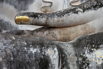 statue of buddha in a temple (wat si chum) in sukhothai in thailand