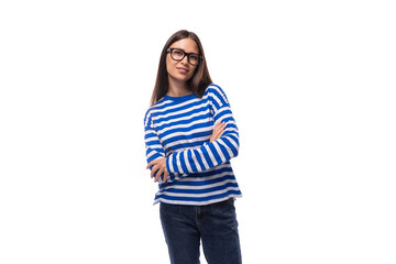 positive smiling young brunette woman in eyeglasses feels confident