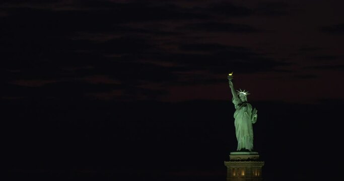 Statue of Liberty Against Dark Sky