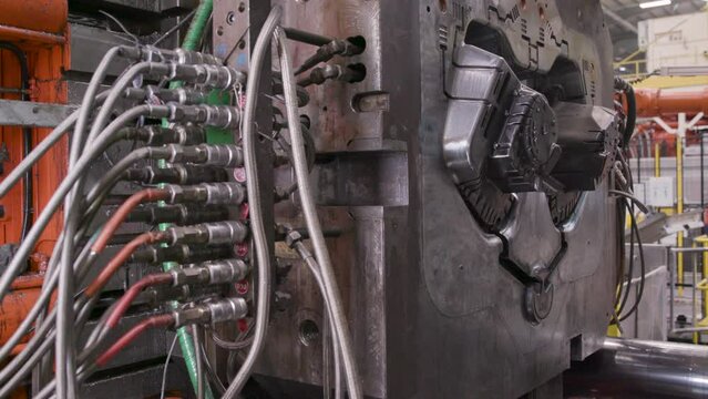 Working parts in a die casting factory.