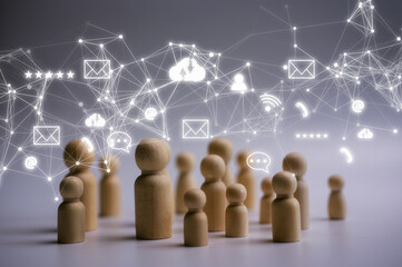lifestyle and social media concept Social gathering with text message bubbles and icons on wooden dolls