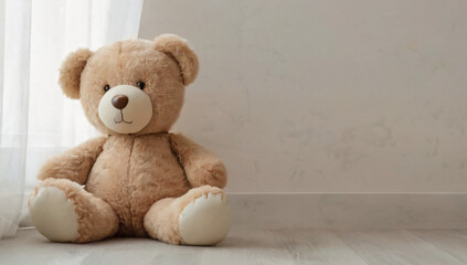 Small teddy bear  on light background with copy space