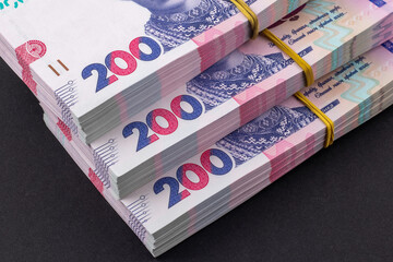 Stack of ukrainian money hryvnia. grivna, hryvna with 200 banknotes