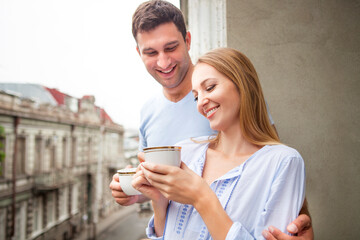 Happy young beautiful couple in the morning
