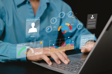 young businessperson using big data analysis and cloud technology to collect customer data and display on application dashboard from digital tablet to understand sale forecast and marketing plan..