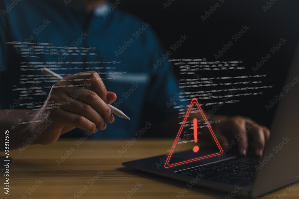 Poster Staffs or Businessman, programmer, developer using computer laptop with triangle caution warning sign for notification error and maintenance concept. Virus detected warning, Cybercrime protection..
