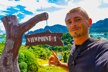 Tourist at Koh Phi Phi Thailand island viewpoint panorama view.