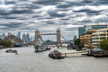 River Thames With Tower Bridge And Warship Belfast In Front Of London Skyline With Modern Skyscrapers In The United Kingdom - obrazy, fototapety, plakaty