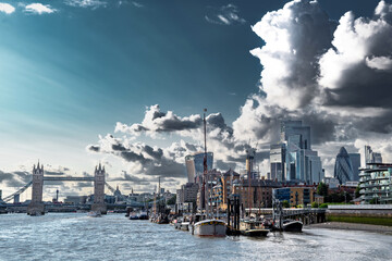 Tower Bridge And River Thames With Ships And Boats In Front Of Modern Office Buildings In The City...