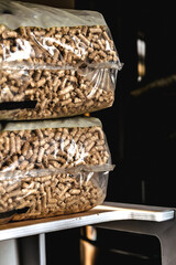 Stack of pellet bags, renewable energy, compressed wood, alternative lifestyle